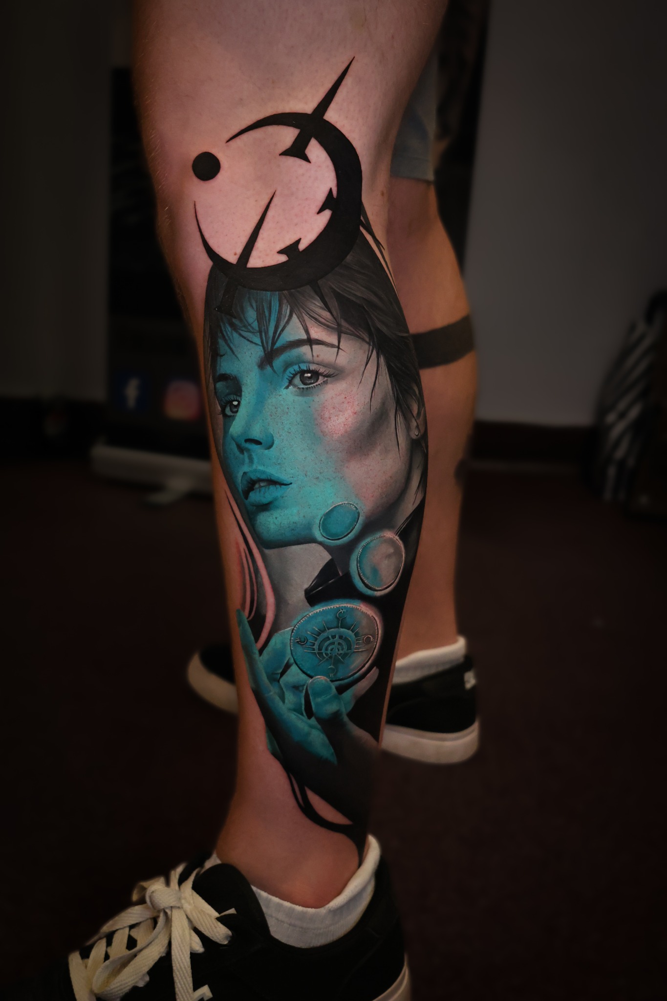 Colour realism portrait and symbolic tattoo