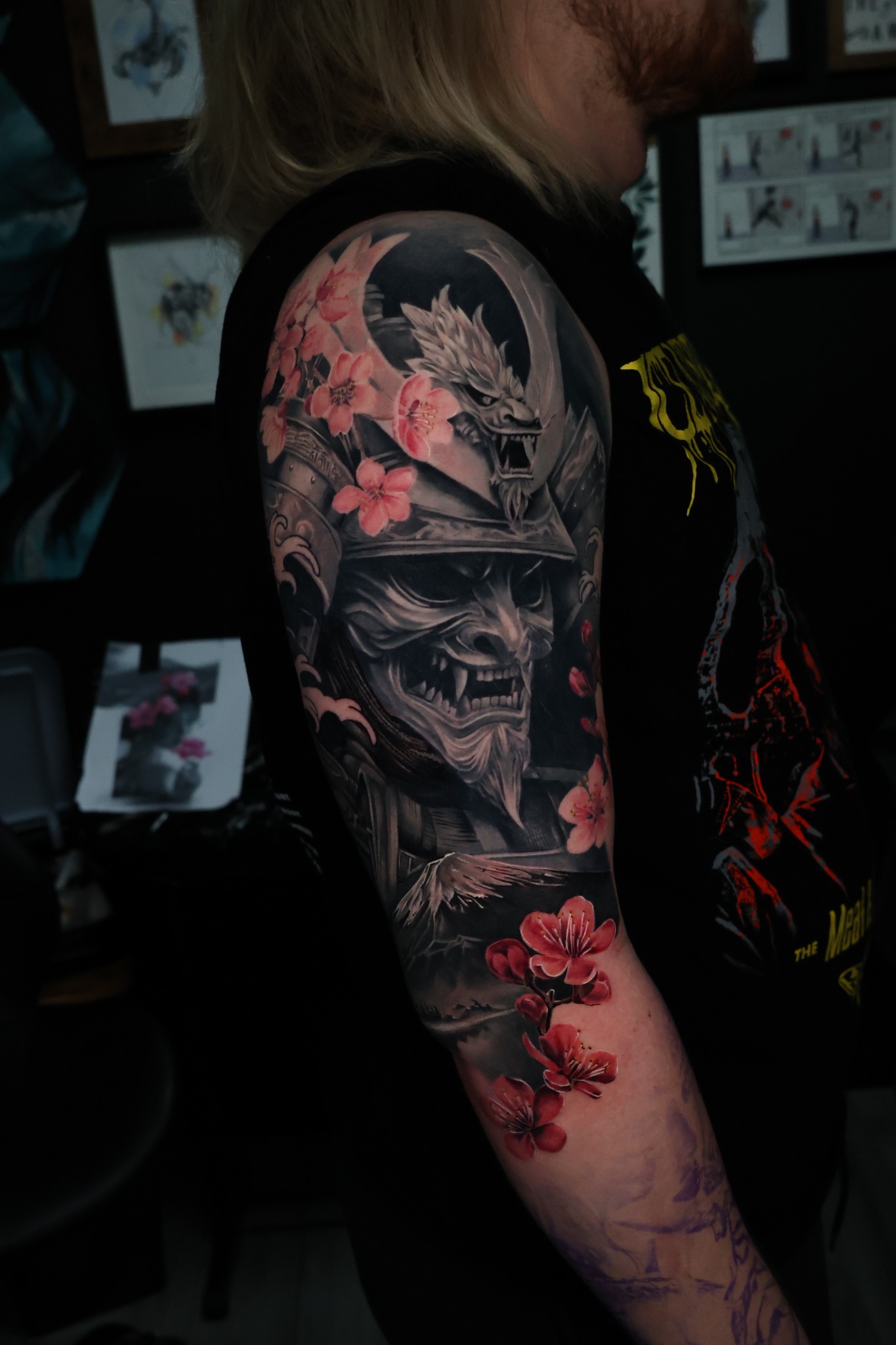 Japanese inspired sleeve tattoo with blossoms